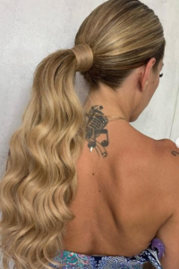 Sleek Low Ponytail with Waves